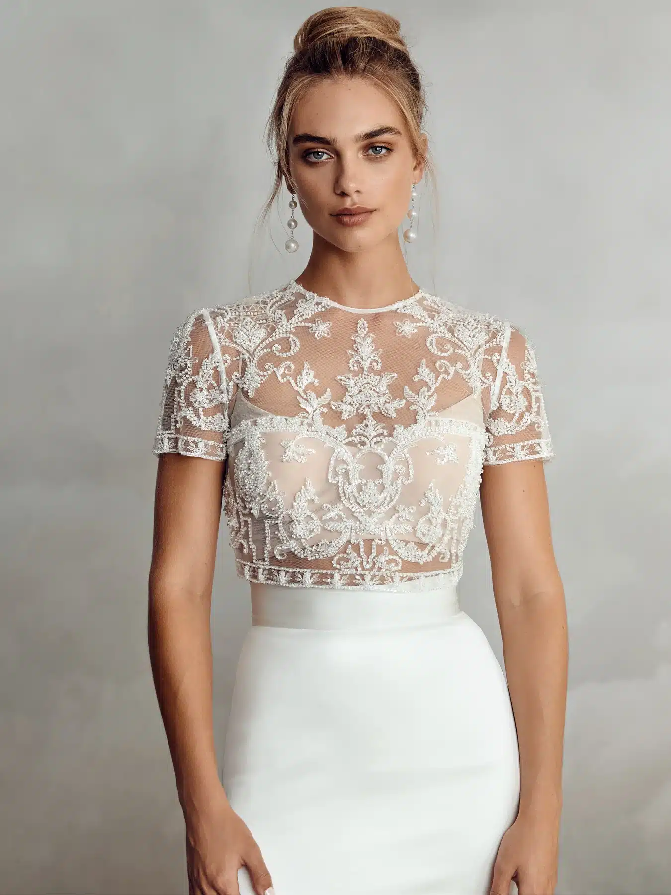 Diora Topper, robe de mariée Catherine Deane, au showroom Queen to be